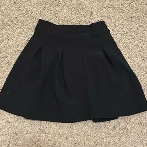 Black pleated skirt